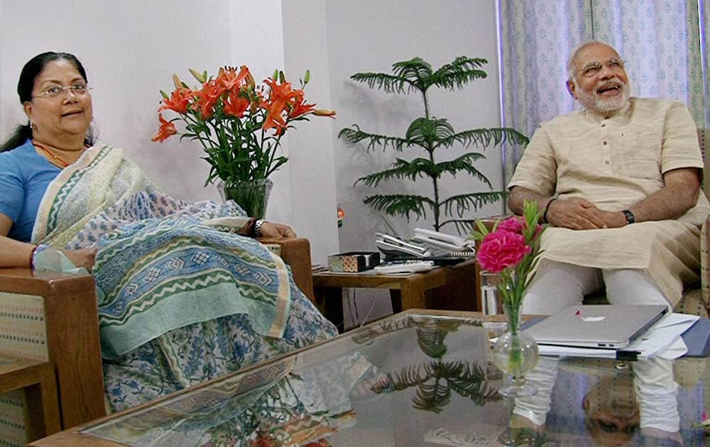 Bharatiya Janata Party leader and the next Prime Minister Narendra Modi with Rajasthan Chief Minister Vasundhara Raje in New Delhi.