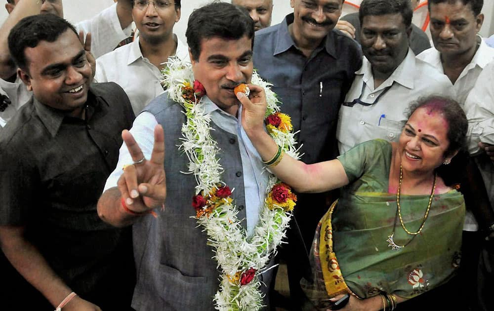 BJP candidate Nitin Gadkari being offered sweets by his wife Kanchan after his win in Lok Sabha elections in Nagpur.