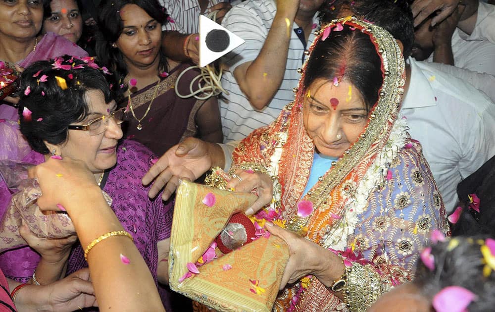 BJP Leader Sushma Swaraj being welcomed by her family members after she won Vidisha Loksabha seat, in Bhopal.