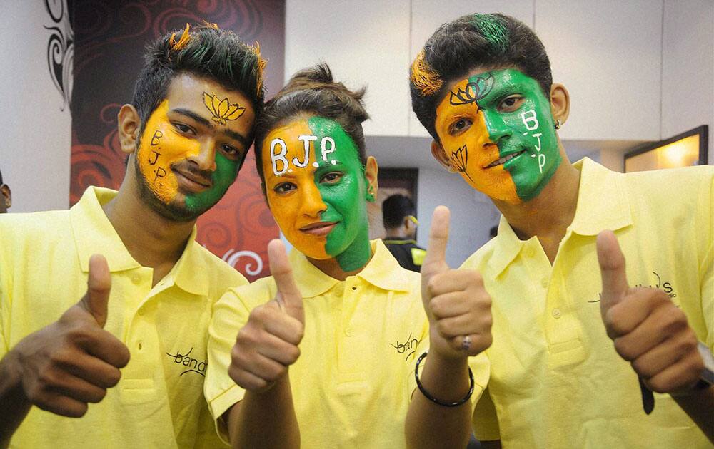 BJP SUPPORTERS CELEBRATE ON THE EVE OF COUNTING FOR LOK SABHA ELECTIONS, IN LUCKNOW.