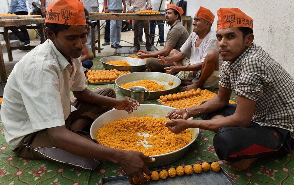 Laddu`s (sweets) being prepared by BJP workers at BJP headquarters in New Delhi on the eve of counting of votes in the Lok Sabha elections.