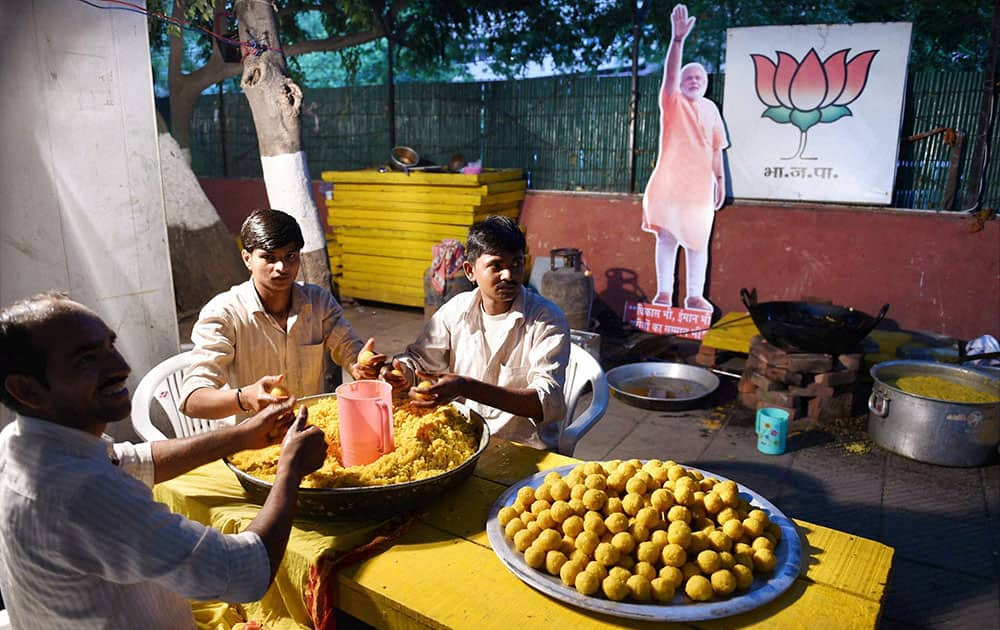 Laddu`s (sweets) being prepared by BJP workers at the party`s Delhi Pradesh office in New Delhi on the eve of counting of votes in the Lok Sabha elections.
