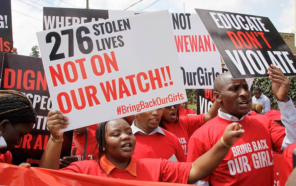 A coalition of Kenyan women`s groups stage a protest in solidarity with their counterparts in Nigeria and demanding the release of the hundreds of schoolgirls abducted in Nigeria by the Muslim extremist group Boko Haram, in downtown Nairobi, Kenya.