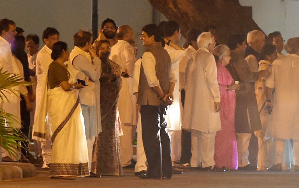 Congress leaders leave after the farewell dinner of Prime Minister Manmohan Singh hosted by Congress President Sonia Gandhi at her residence 10 Janpath in New Delhi.