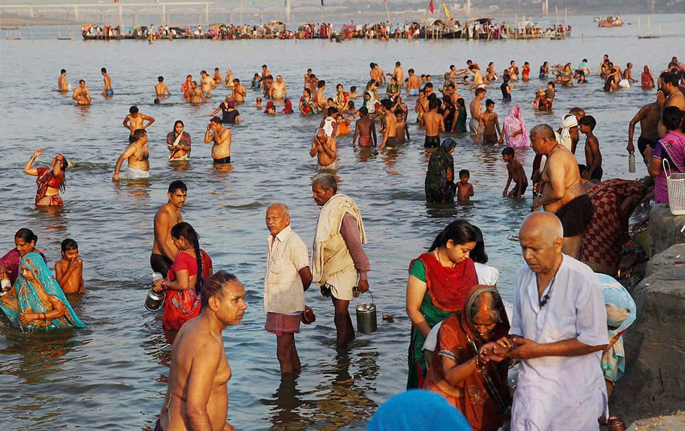 Hindu devotees taking holy dip at Sangam on the occasion of Buddha Purnima in Allahabad.