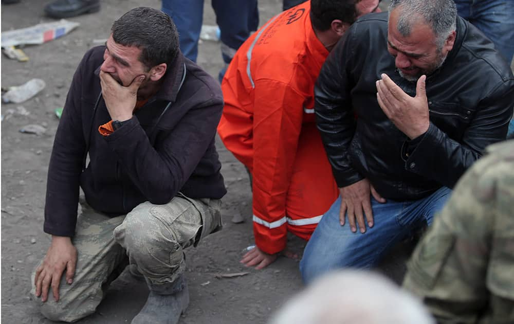 Family members react, as they wait outside the mine in Soma, western Turkey.