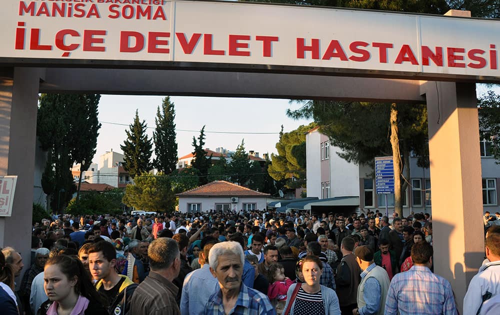 People at the entrance of the local hospital after an explosion and fire at a coal mine in Soma, in western Turkey.