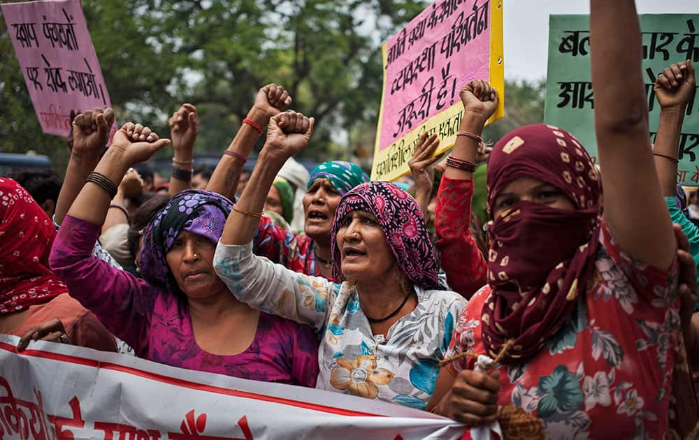 Dalit women shout slogans during a protest against a gang-rape of four Dalit girls in Haryana’s Hisar district, as they gather outside the residence of Haryana Chief Minister Bhupinder Singh Hooda in New Delhi.