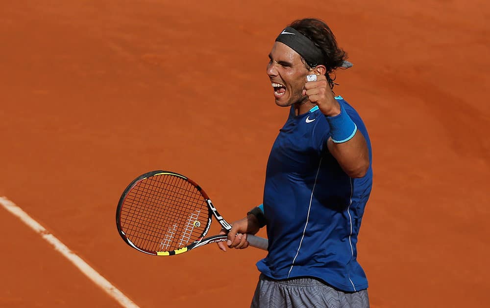 Rafael Nadal from Spain celebrates his victory during a Madrid Open tennis tournament semifinal match against Roberto Bautista Agut from Spain in Madrid.