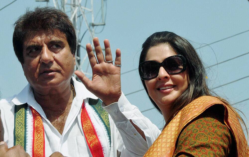 Actors and Congress leaders Raj Babbar and Nagma during Congress Vice-President Rahul Gandhi`s election road show in Varanasi.