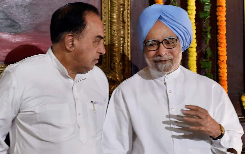 Prime Minister Manmohan Singh with BJP leader Subramanian Swami during Rabindra Nath Tagore`s 153rd birth anniversary at Parliament House in New Delhi.