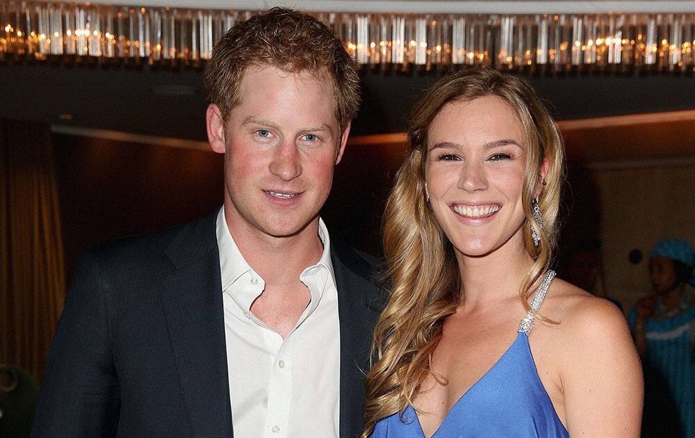 Britain`s Prince Harry, left and Sentebale ambassador, British singer Joss Stone, attend the Sentebale Summer Party, in London.