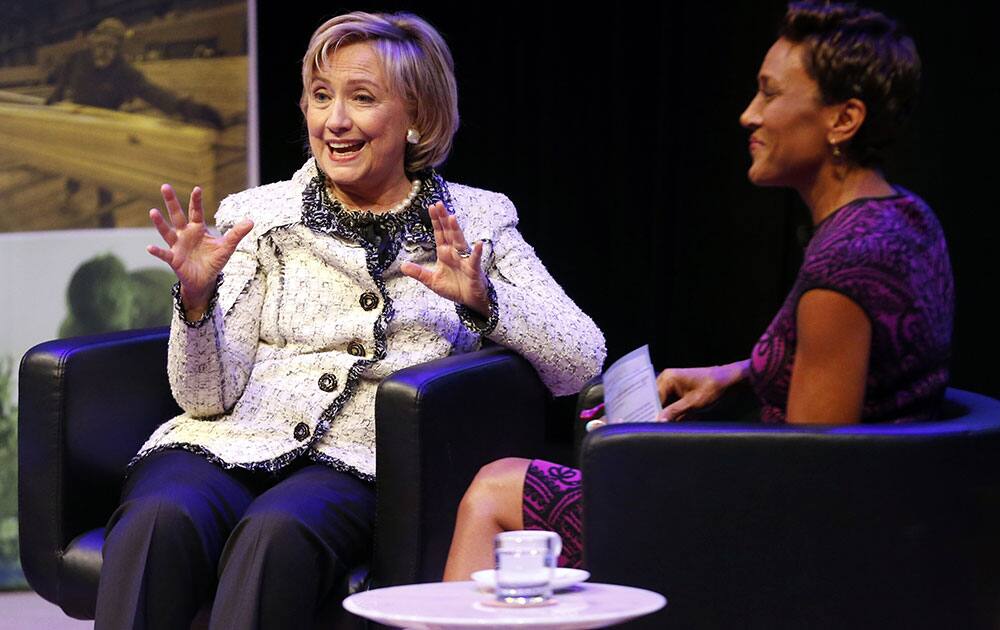 Former Secretary of State Hillary Rodham Clinton, left, is interviewed by television journalist Robin Roberts during the Philanthropy New York`s annual meeting, at the Ford Foundation in New York. 