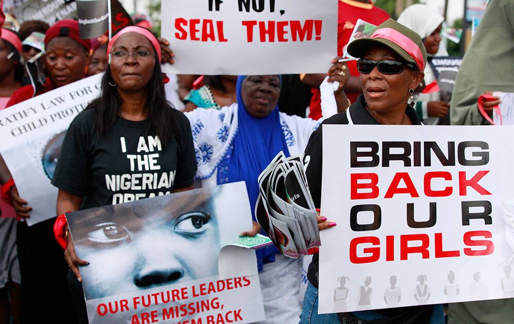 Women attend a demonstration calling on the government to rescue kidnapped school girls of a government secondary school Chibok, in Lagos, Nigeria.