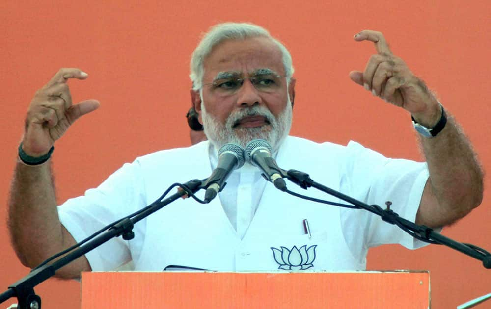 BJP PM candidate Narendra Modi addresses an election rally in Amethi.