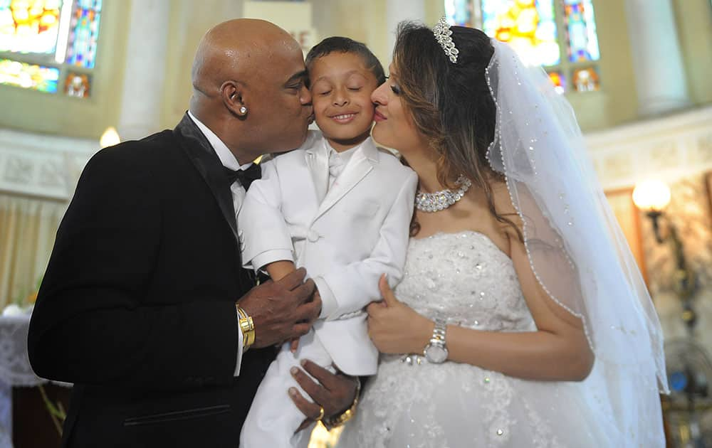 Vinod Kambli and Andrea Hewitt with their son Jesus Christiano at St Peter’s Church, Bandra in Mumbai. dna