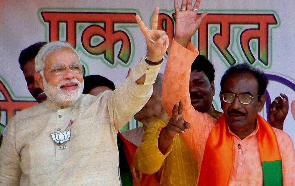 BJP Prime Ministerial candidate Narendra Modi during an election campaign in support of his party candidate at Bankura district in West Bengal.