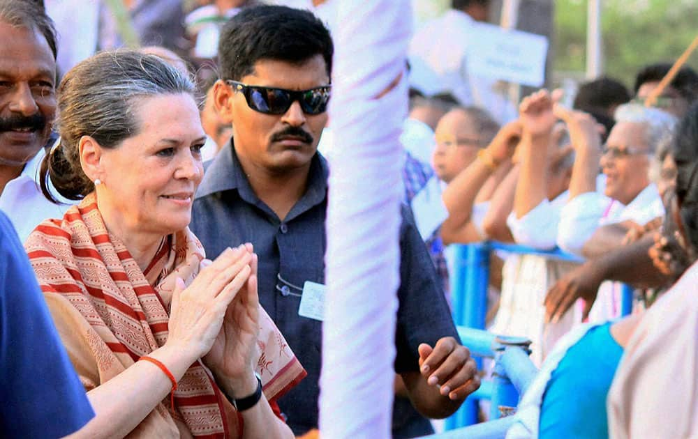 Congress President Sonia Gandhi meeting people at an election campaign meeting in Guntur.