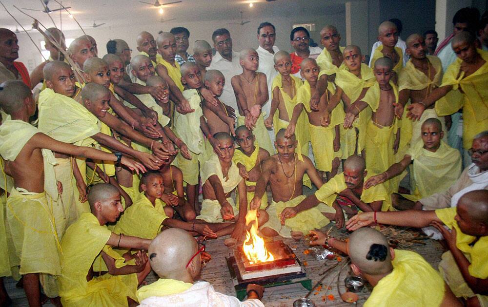 Brahmin boys take part in a Yajnopavit ritual in Varanasi on the occasion of Akshaya Tritiya.