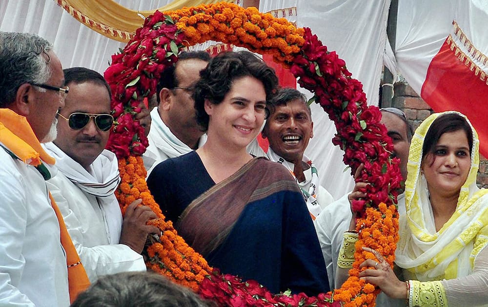 Priyanka Vadra being welcomed by party workers during an election campaign meeting in Amethi.