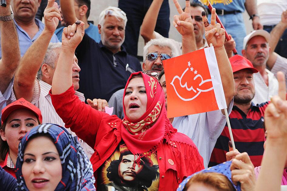 Supporters of the Iraqi Communist Party take part in a May Day celebration in Baghdad, Iraq.