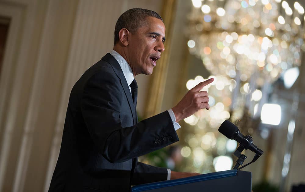 President Barack Obama speaks about increasing the minimum wage, in the East Room of the White House in Washington. 