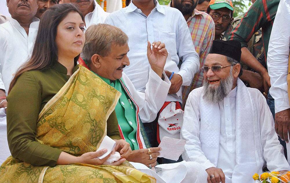 Bollywood actress Nagma along with local Congress leaders from Allahabad during an election campaign rally at Meja village,near Mirzapur.