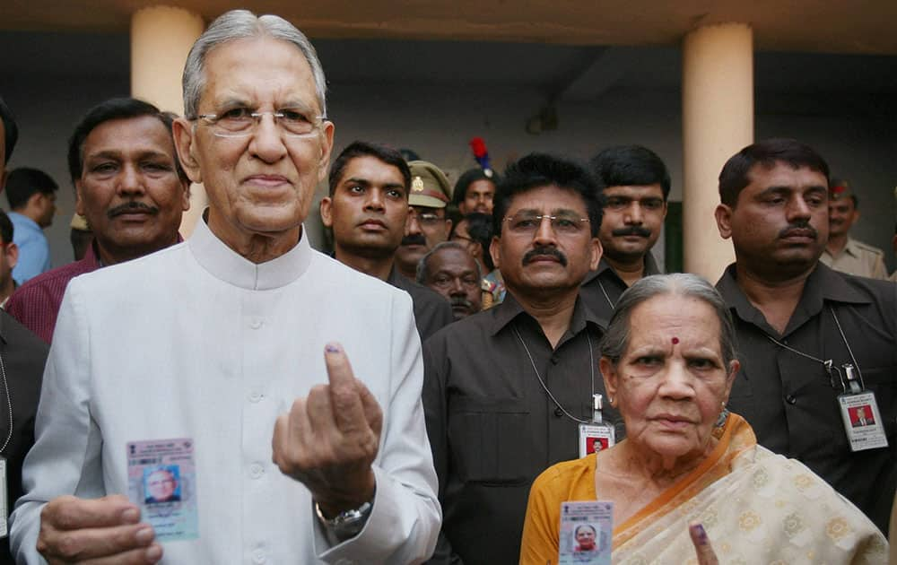 Uttar Pradesh Governor B L Joshi and his wife cast their vote in Lucknow.