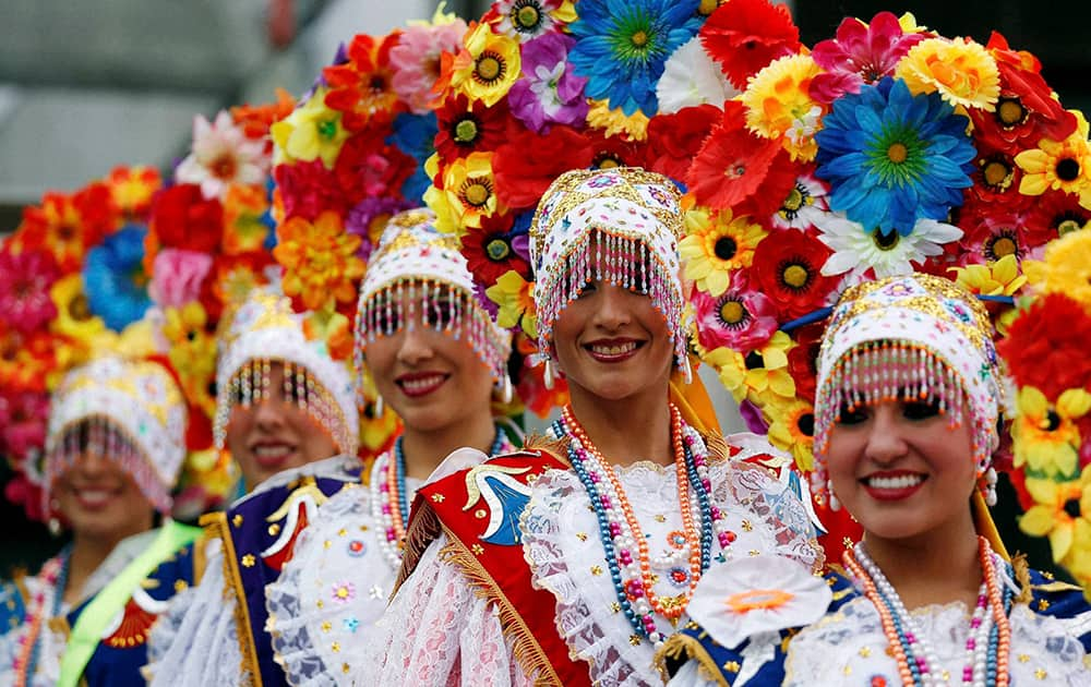 Dancers from Peru attend the opening ceremony of the International Book Fair in Bogota, Colombia.