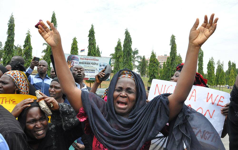 An unidentified mother cries out during a demonstration with others who have daughters among the kidnapped school girls of government secondary school Chibok, in Abuja, Nigeria.