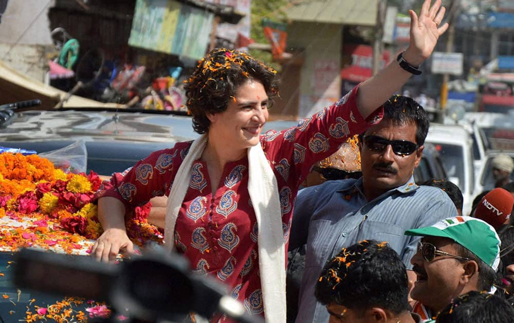 Priyanka Vadra waves during an election campaign for her mother and Congress President Sonia Gandhi in Raebareli.