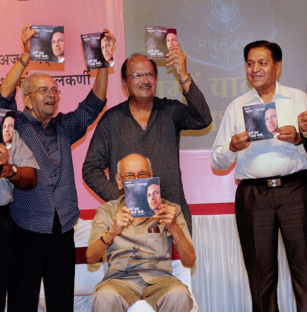 Legendary cricketers from right Chandu Borde, Ajeet Wadeker, Bapu Nadkarni (front) and Vasu Paranjpe launch book `Bharat Ratna Sachin` Tumhe Yad Karte Karte to celebrate Sachin Tendulkar`s 41st Birthday in Mumbai.