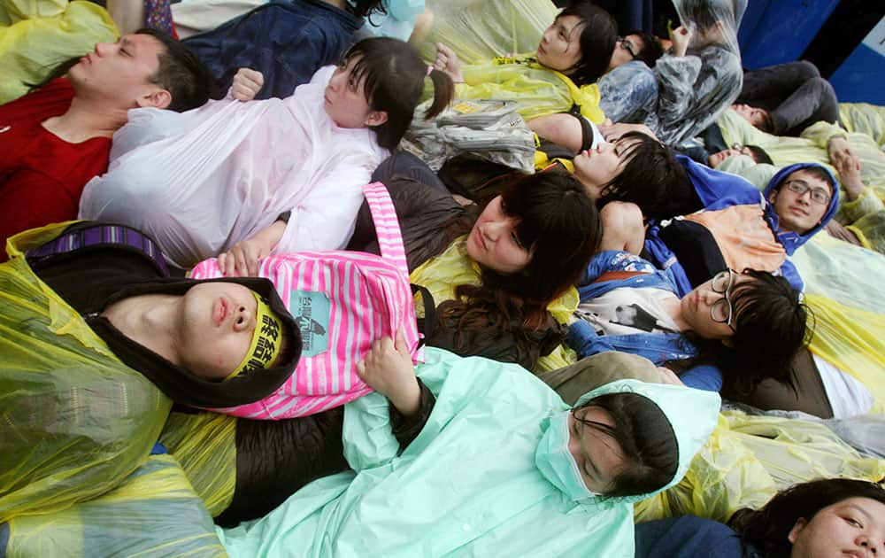 Protesters participate in a sit-in to demonstrate against the construction of Taiwan`s fourth nuclear power plant in Taipei, Taiwan.