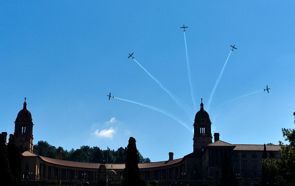 Aircraft perform a flyover above the government`s Union Buildings in Pretoria, South Africa, during 20-year Democracy Anniversary celebrations.