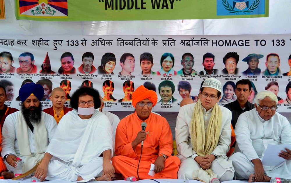 Swami Agnivesh and other religious leaders during a prayer meeting for Tibetan Peoples` Movement for Middle Way in Jantar Mantar, New Delhi.