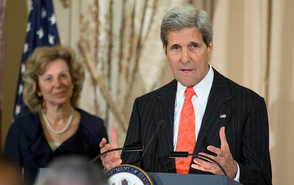 Secretary of State John Kerry speaks during a swearing-in ceremony in the Benjamin Franklin Room of the State Department in Washington.