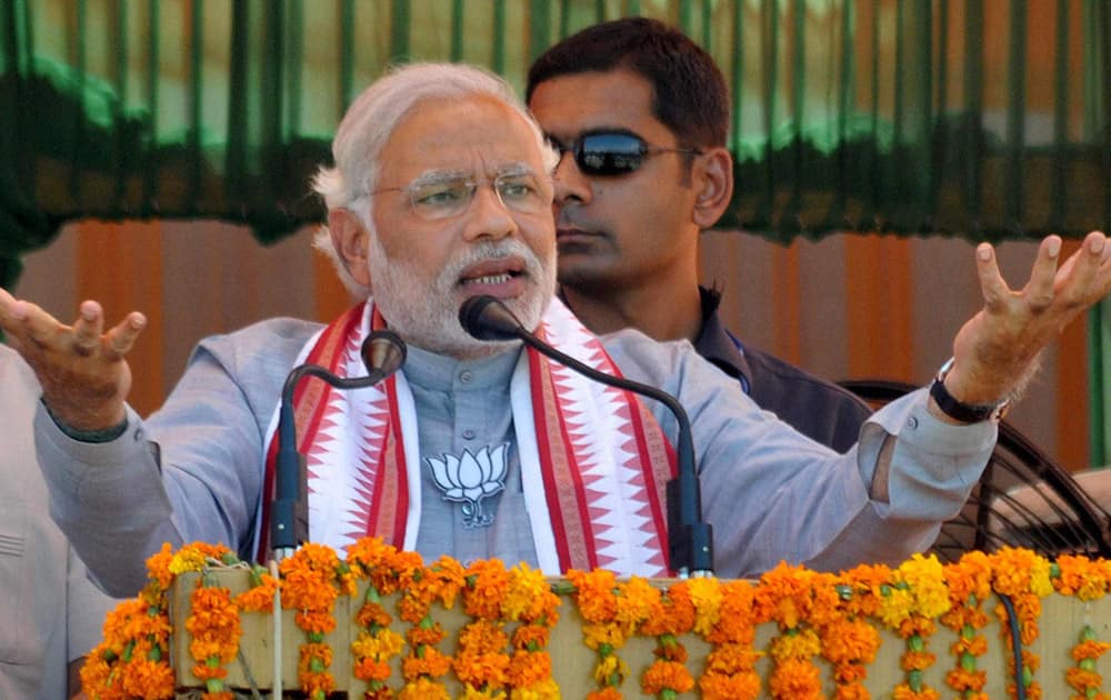 BJP PM candidate Narendra Modi addresses an election rally in Pathankot.