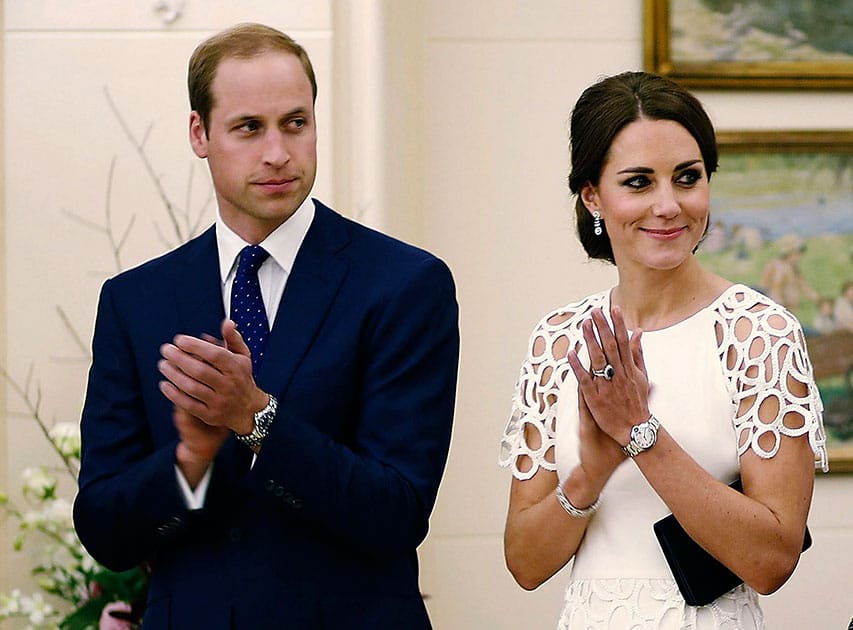 Britain`s Prince William and his wife Kate, the Duchess of Cambridge, listen to an address by the Australian Governor General Peter Cosgrove at a reception at Government House in Canberra, Australia.