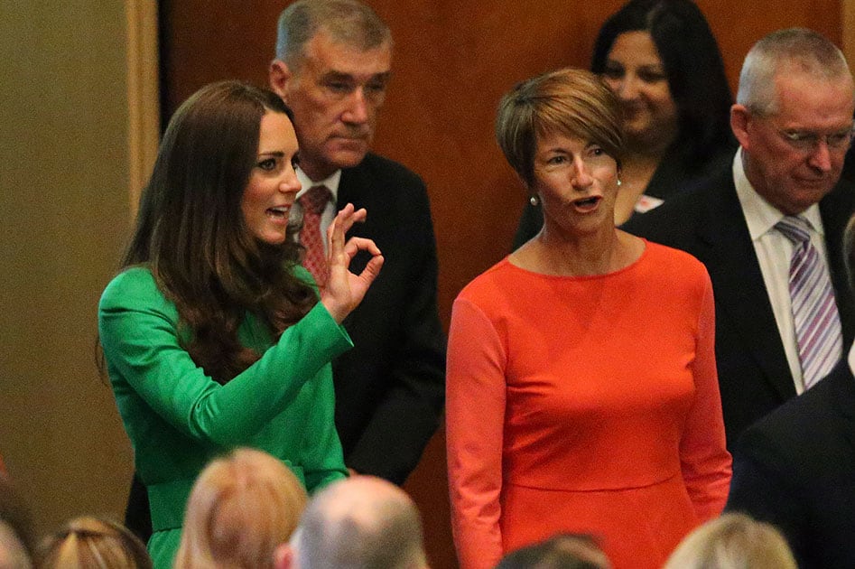 Britain`s Kate, the Duchess of Cambridge, gestures as she arrives with Prime Minister Tony Abbott`s wife Margaret at a reception at Australia`s Parliament House in Canberra, Australia.