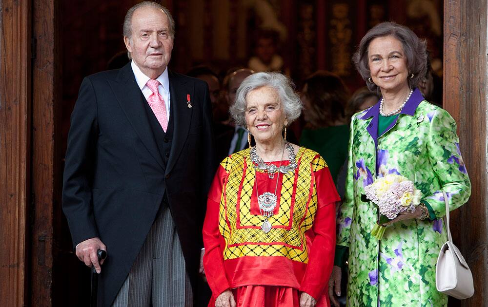 King Juan Carlos of Spain, left, Mexican writer Elena Poniatowska, center, and Queen Sofia of Spain pose before the Cervantes Prize award ceremony at the University of Alcala de Henares, Spain.