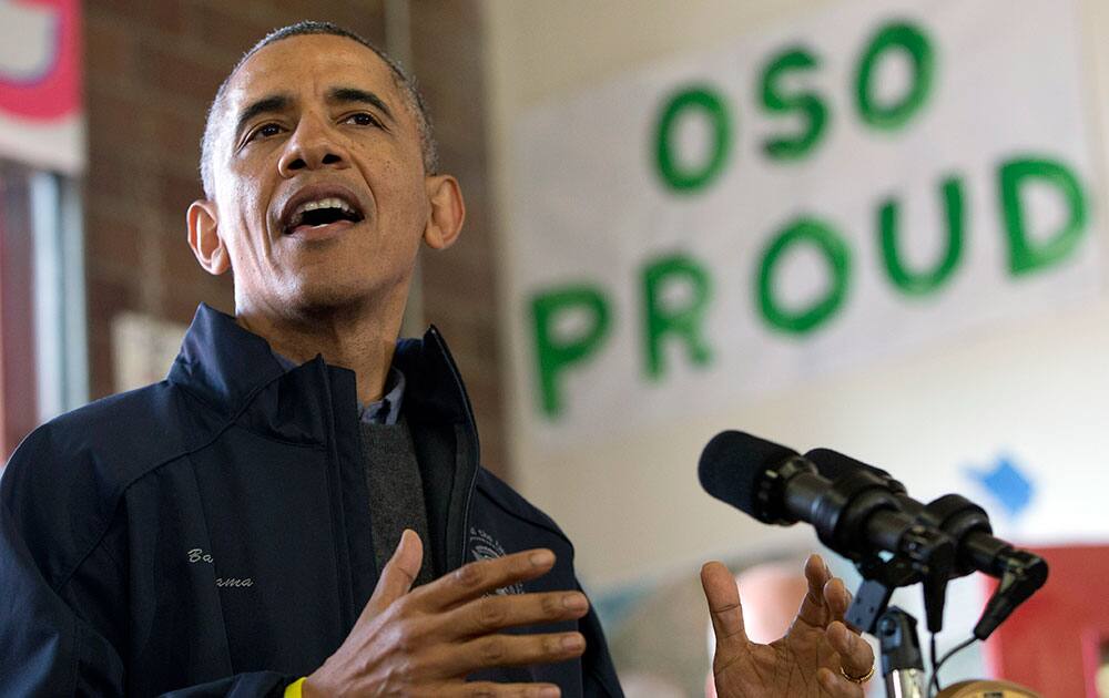 President Barack Obama speaks to first responders, recovery workers and community members at the Oso Fire Department in Oso, Wash., the site of the deadly mudslide that struck the community in March.