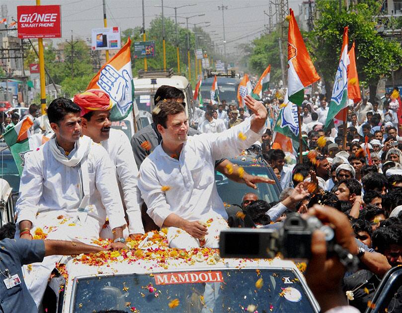 Congress Vice President Rahul Gandhi and Rajasthan Congress Chief Sachin Pilot during a road show in support of party candidate Bhanwar Jitendra Singh, in Alwar, Rajasthan.