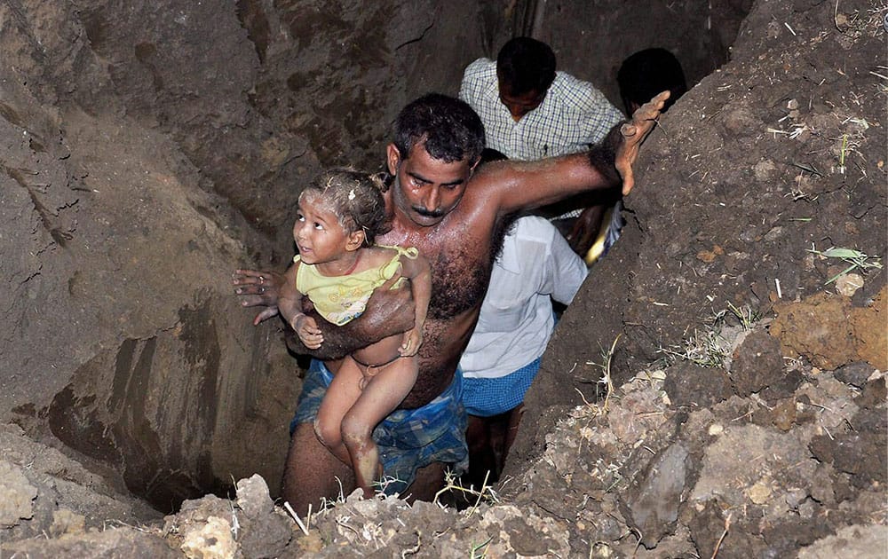 A 2.5-year-old boy being rescued from a deep borewell in which he accidentally fell at Ramkrishna Nagar in Patna.