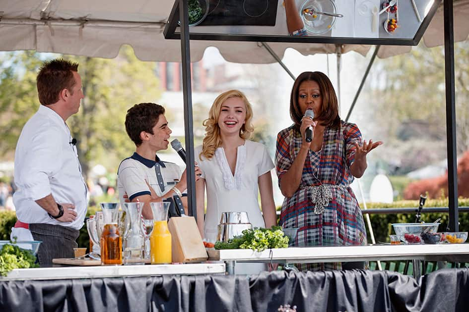 First lady Michelle Obama hosts a healthful recipes demonstration with, chef Marc Murphy, and Cameron Boyce and Peyton List from the Disney Channel show `Jessie,` during the annual White House Easter Egg Roll.