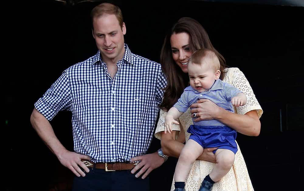 Britain`s Kate, the Duchess of Cambridge, and her husband Prince William watch as their son Prince George looks at an Australian animal called a Bilby, which has been named after the young prince, during a visit to Sydney`s Taronga Zoo, Australia.