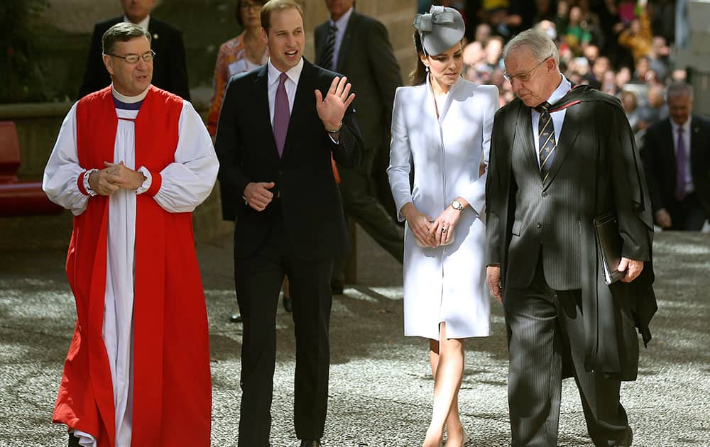 Britain`s Prince William, second from left, and his wife, Kate, the Duchess of Cambridge, second from right, walk with The Most Reverend Glenn Davies, Archbishop of Sydney, left, and The Very Reverend Phillip Jensen, Dean of Sydney, as they arrive at St. Andrew`s Cathedral for Easter Sunday church services in Sydney.