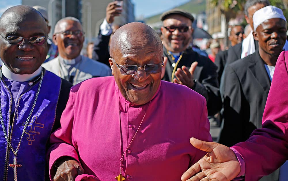 South African Archbishop Desmond Tutu, marches during a rally with other religious leaders under the banner of `A Call to Witness` to parliament in the city of Cape Town, South Africa.