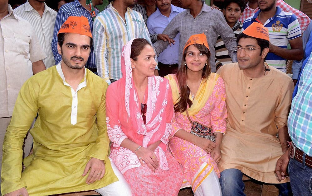 Esha Deol & Ahana Deol along with their husbands Bharat & Vaibhav during a road show in support of their mother BJP candidate Hema Malini in Mathura.