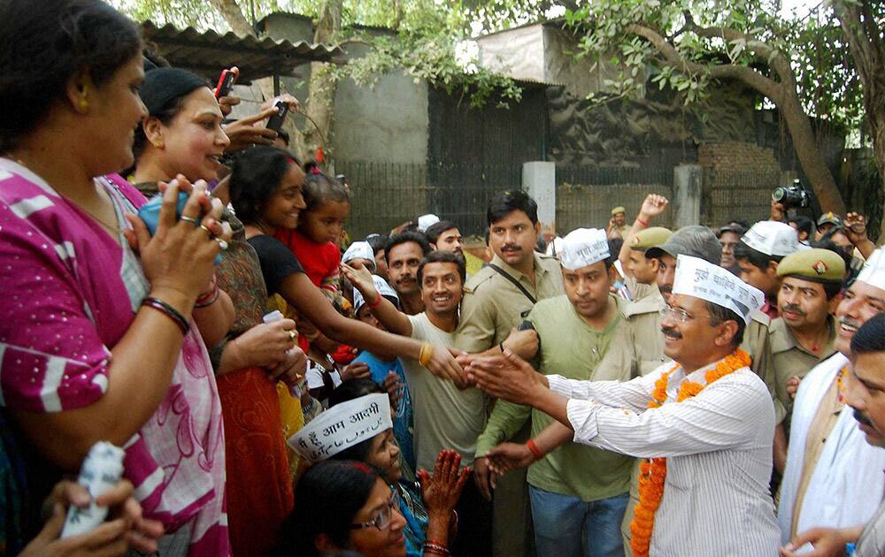 AAP convener Arvind Kejriwal during his election roadshow in Varanasi.