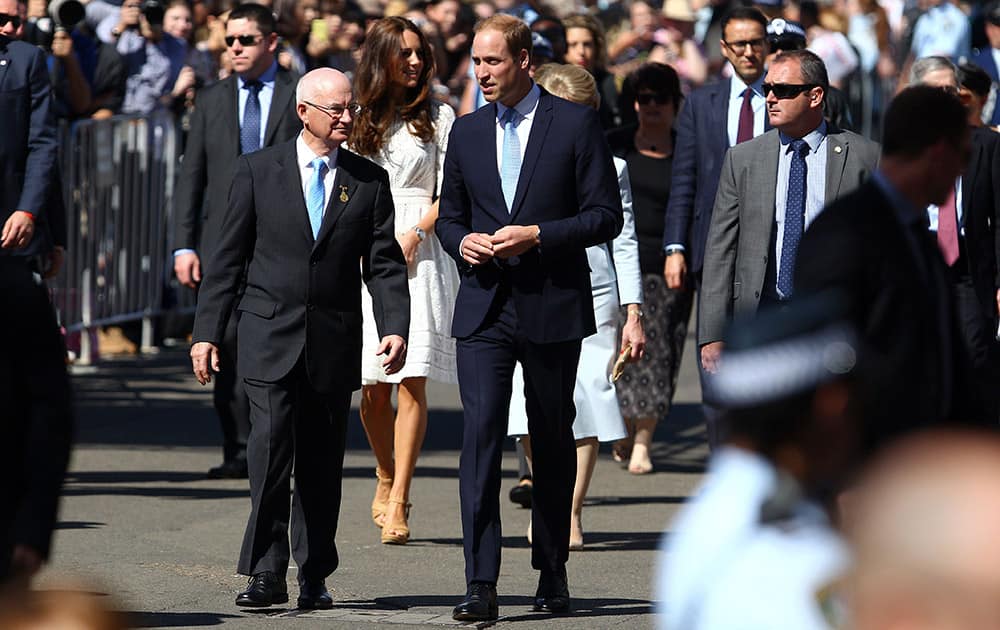 Britain`s Prince William and his wife, Kate, the Duchess of Cambridge tour the Sydney Easter Show with Glenn Dudley, president of the Royal Agricultural Society, in Sydney.